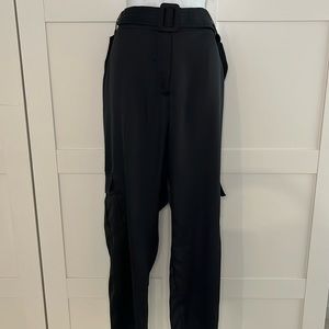 NY&Co Gabrielle Union. NWT Black satin pants with detailed pockets and belt.